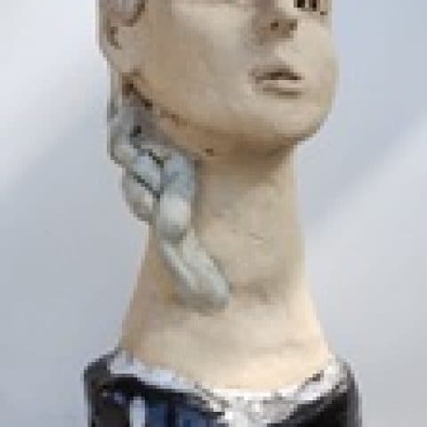 1º Prêmio: Escultura "Cabeça de mulher"